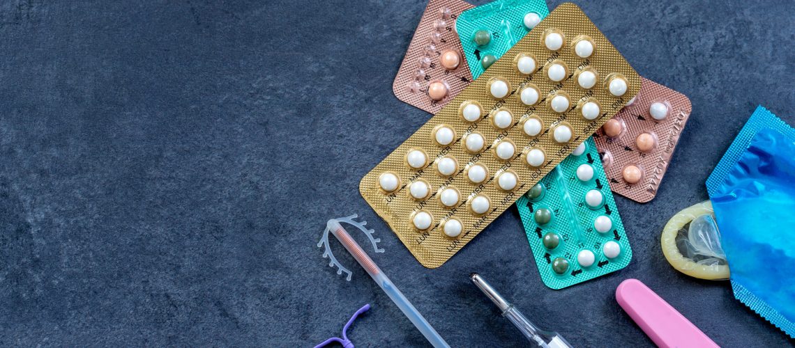 Choosing method of contraception : Birth control pills, an injection syringe and condom,IUD-method