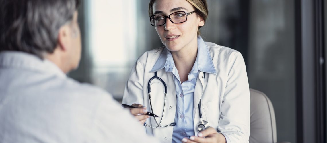 Doctor talking to the patient