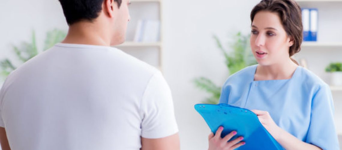 Patient visiting doctor for annual regular check-up in hospital clinic